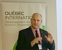 Hugo Saint-Laurent, CEO of SiliCycle, doing a presentation of the company to the guest from Québec International